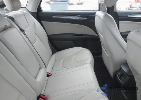 2015 Ford Fusion Titanium z USA, uszkodzony, nr VIN 3FA6P0K97FR238461